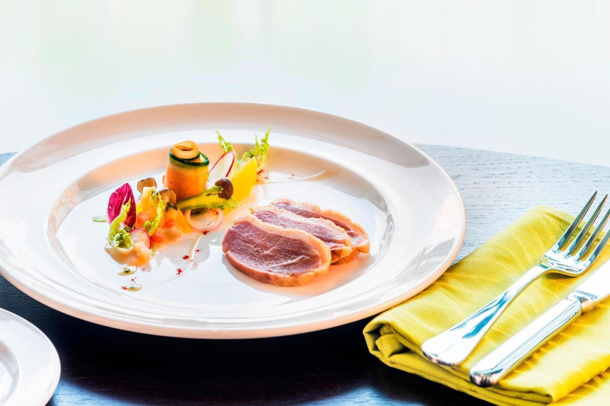 Le Meridien Putrajaya Ngoại thất bức ảnh A plate of duck confit