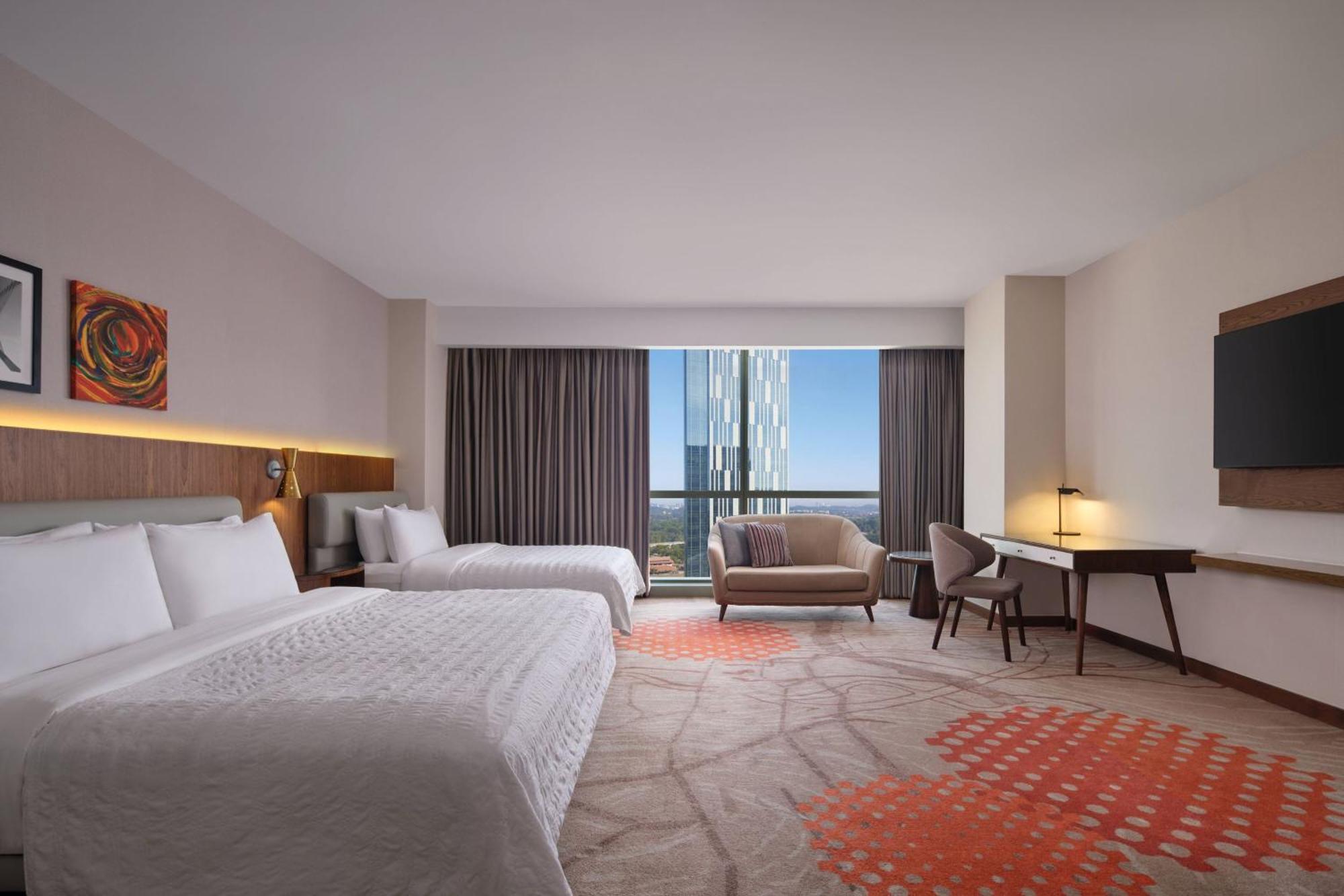 Le Meridien Putrajaya Ngoại thất bức ảnh A guest room at the hotel